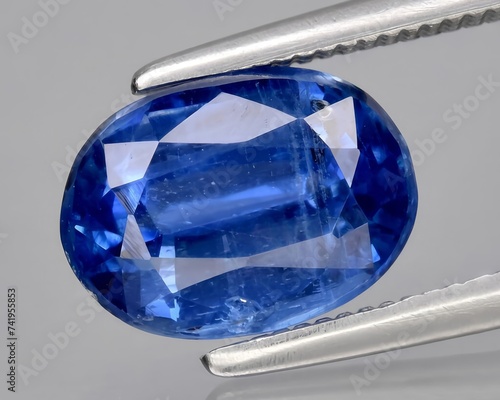 natural blue kyanite gem on the background photo