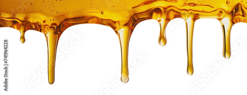Liquid honey dripping over white transparent background photo