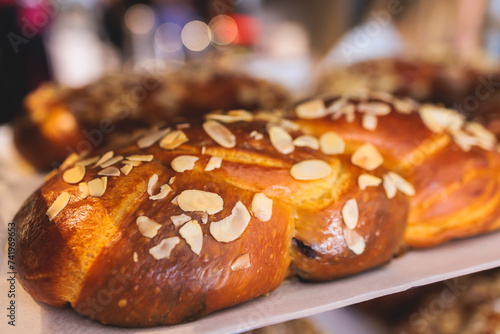 Tsoureki, Traditional Greek Easter Bread, greek freshly baked cake in Athens, Greece, with almond, mastiha, mahleb and cinnamon, orthodox Easter in Greece, sweet bread with red eggs