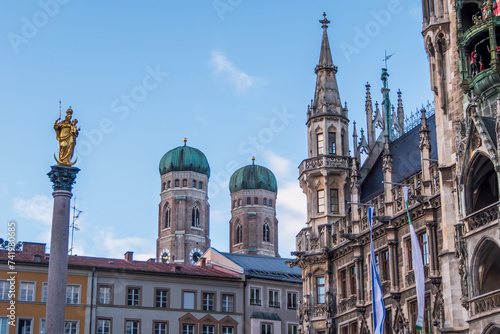 View on Marienplatz city hall (Neues Rathaus) and Church of Our Blessed Lady (Frauenkirche) in Munich (Germany).