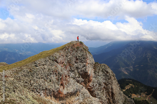 person on the top of the mountain