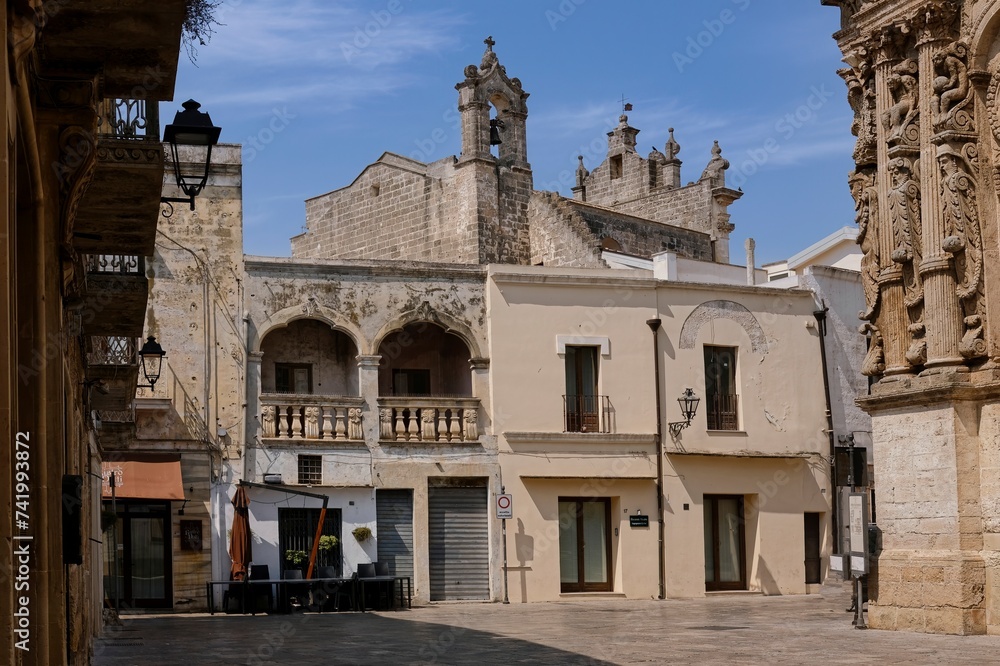 The extraordinary facades of some Lecce Baroque style houses, located in the beautiful town of Nardò, Puglia, Italy. The extraordinary facades of some Lecce Baroque style houses, located in the beautiful town of Nardò, Puglia, Italy.