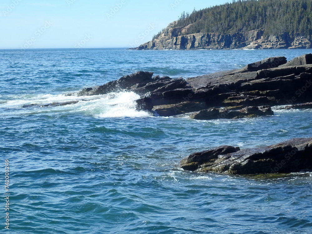 Ocean waves meeting a rocky shore Ocean waves meeting a rocky shore