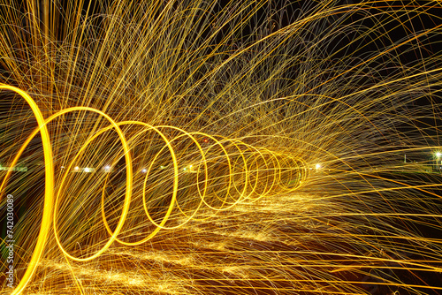 Dynamic Light Painting with Golden Spirals and Steel Wool Trails