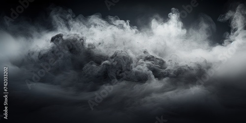 Black smoke exploding outwards with empty center. Dramatic smoke or fog effect