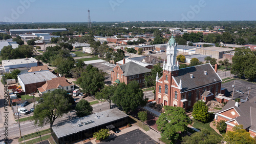 Afternoon view of a historic church and buildings in Old Town Wichita Kansas, USA. photo