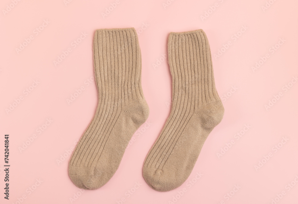 Warm wool socks on a light background Warm wool socks on a light background