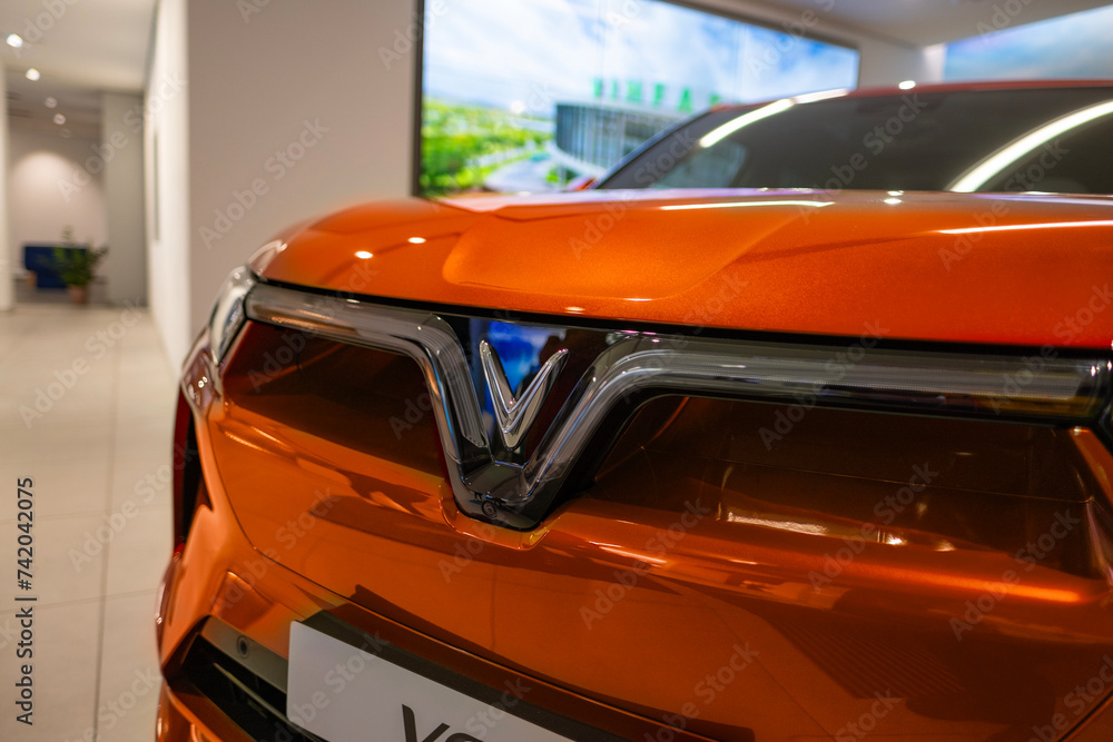 new red Vinfast vf 9 electric SUV in Studio, advanced technologies in
