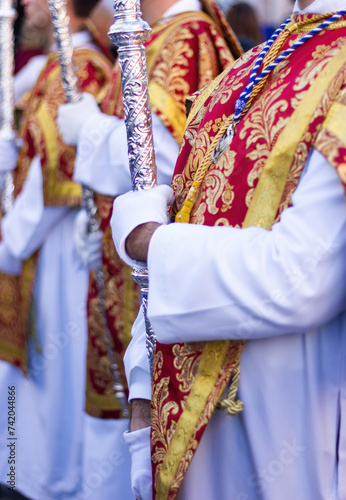 Colorful costumes of the Acolyte Corps in an Andalusian Holy Week procession. © Joaqun