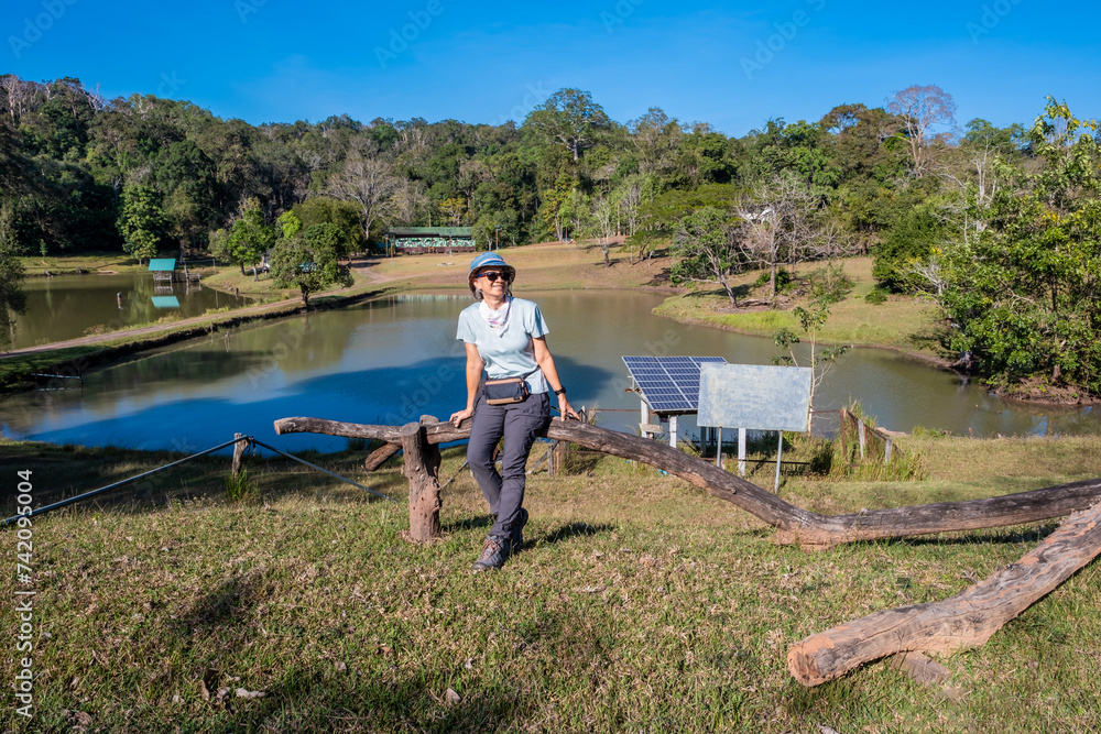 Female tourists sitting at the Phu Khieo Wildlife Sanctuary, Chaiyaphum, Thailand.