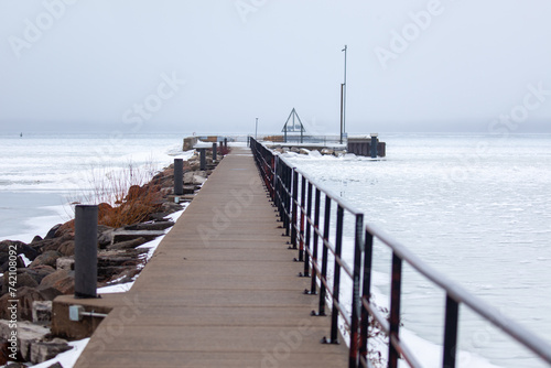 Pier on a frozen lake