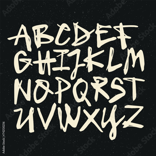 Vector handwritten calligraphic watercolor alphabet, white on black background. Hand drawn alphabet written with brush pen. Mayuscula – big letters. (ID: 742130216)