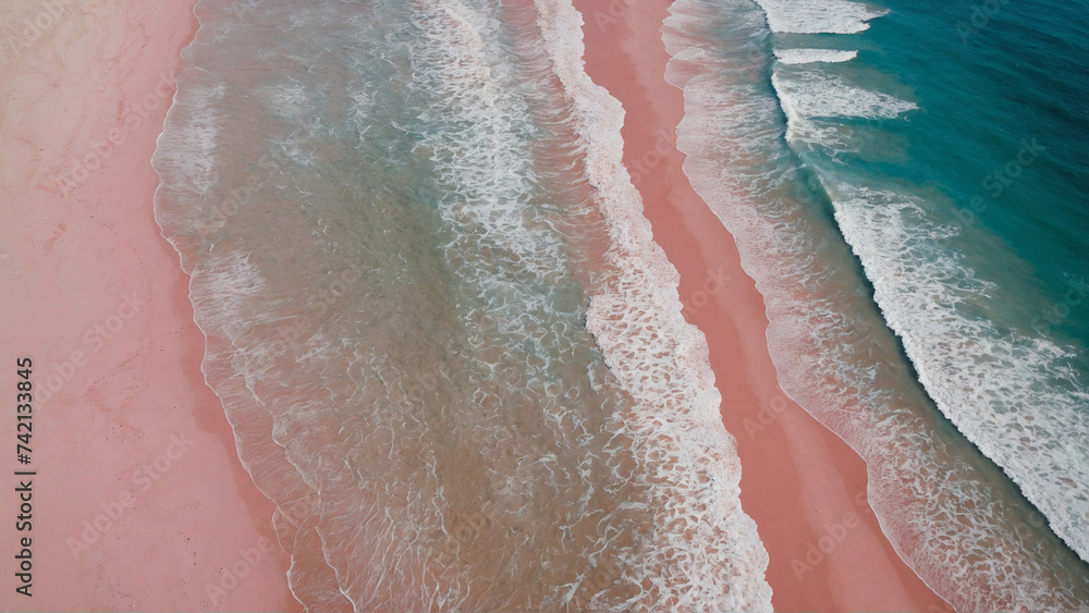 Aerial view of beach with pink sand