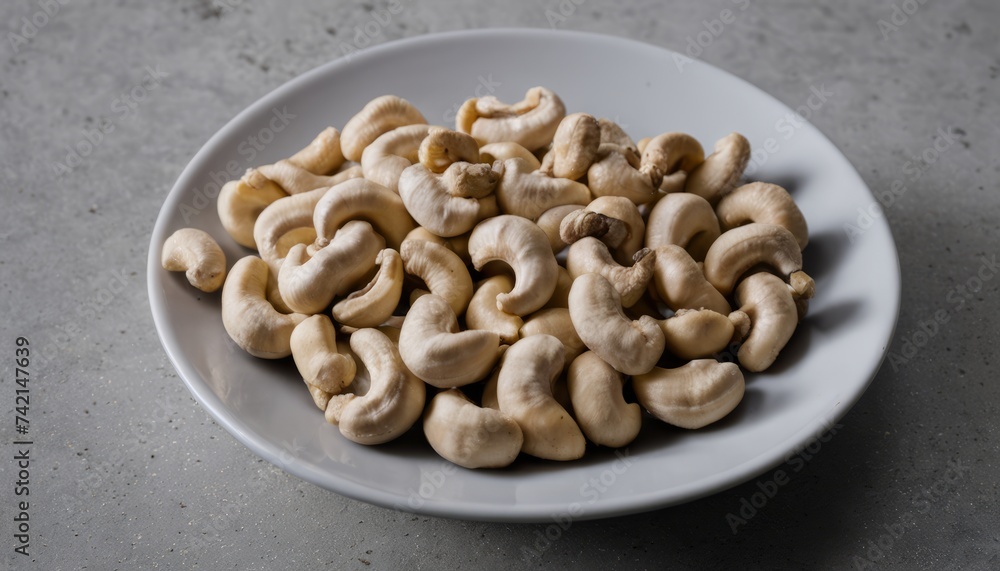 Nutty Delight - A bowl of cashews ready to be savored Nutty Delight - A bowl of cashews ready to be savored