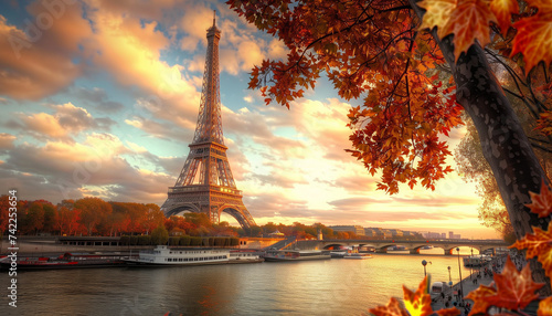 The Eiffel Tower stands against a backdrop of autumn leaves and a golden sunset over the Seine River in Paris