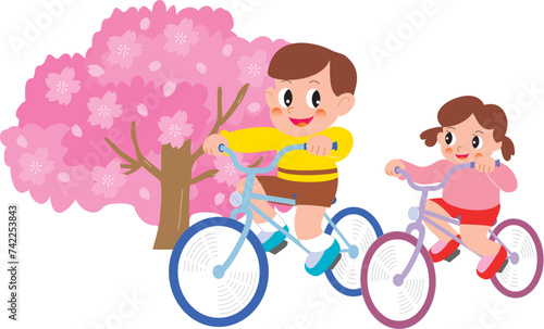 桜と自転車に乗る男の子と女の子
