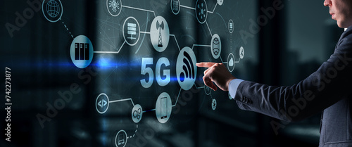 5G Network Wireless Internet concept. Man touching 3D icon 5G