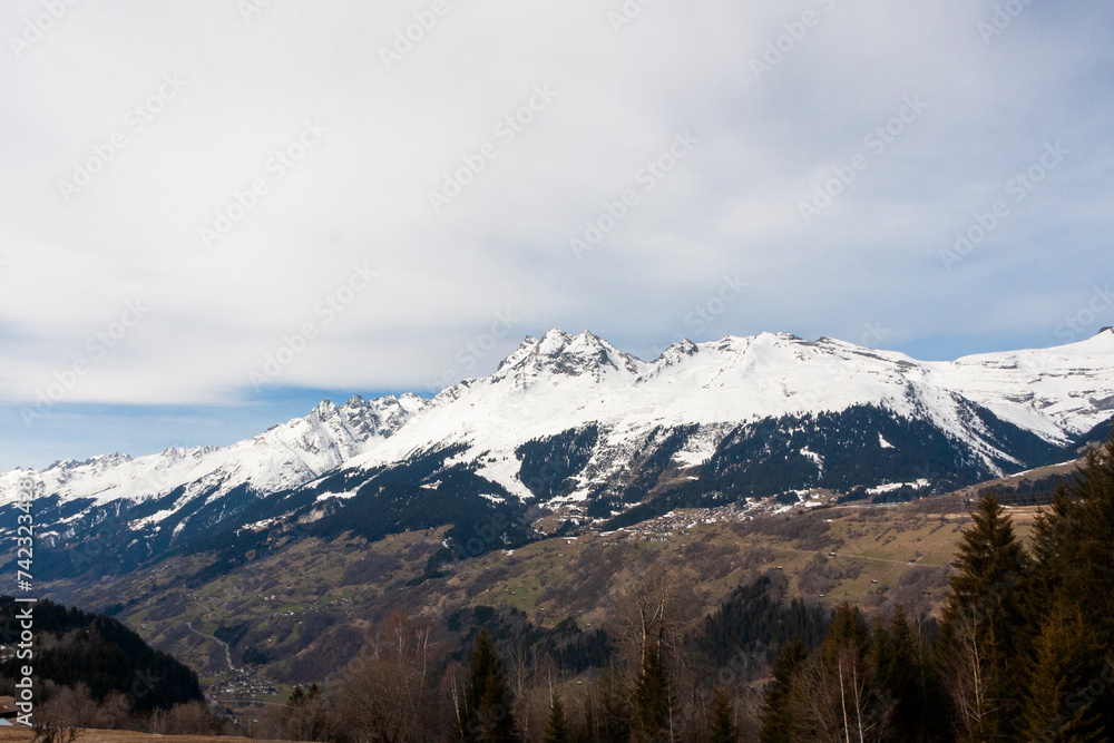 Ruchi mountain in the Glarus Alps, and village of Waltensburg/Vuorz in Graubünden, Switzerland