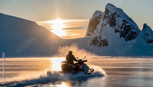 Snowy adventure at dusk or dawn, highlighting the thrill of snowmobiling against a majestic mountainous horizon