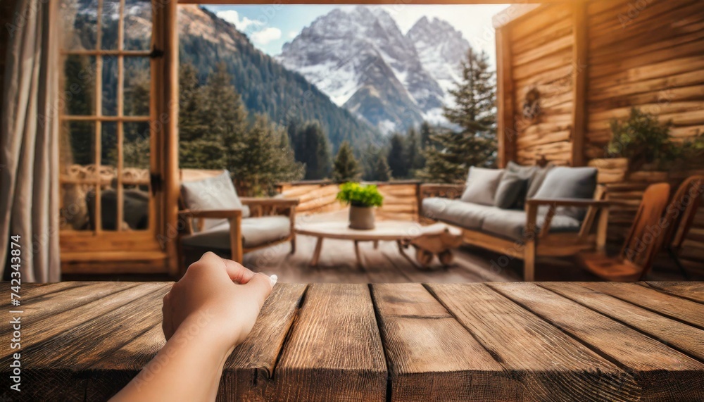 peaceful coffee moment with a stunning mountain view from a cozy cabin terrace - obrazy, fototapety, plakaty 
