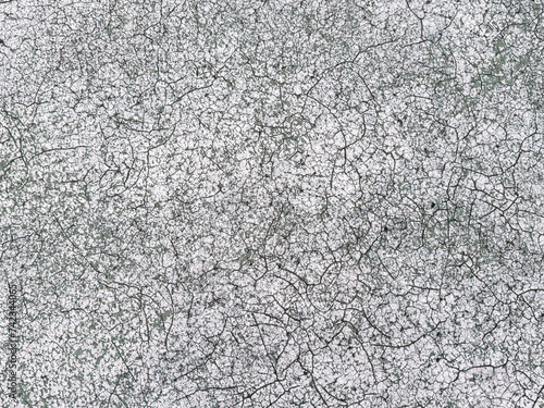 Old covering on a sports ground as an abstract background. Texture