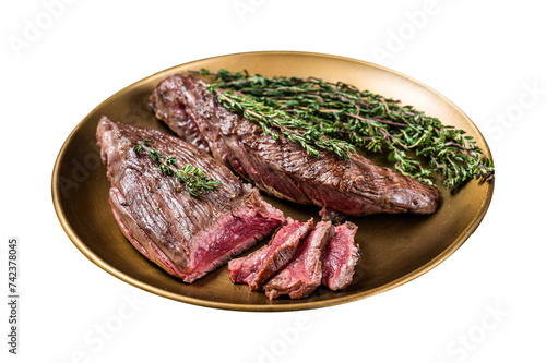 BBQ grilled Bavette Bavet beef meat steak with herbs on a plate. Isolated, Transparent background.