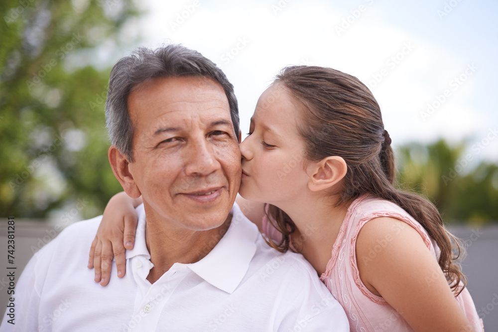 Outdoor, portrait and girl kiss grandpa on summer, holiday or vacation together in retirement with love. Senior, man and grandparent relax with child in backyard, garden or hug in Mexico with care Outdoor, portrait and girl kiss grandpa on summer, holiday or vacation together in retirement with love. Senior, man and grandparent relax with child in backyard, garden or hug in Mexico with care