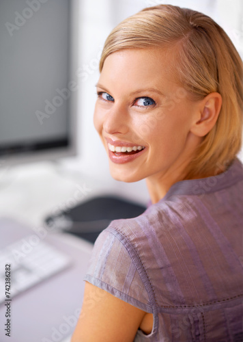 Woman, happy and portrait with pride in office for administration job at startup agency with computer. Person, employee or staff with excited face, smile or clothes for professional career in Sweden