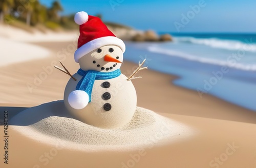 Snowman made of sand with Santa hat on beach near sea at sunset  space for text. Christmas vacation