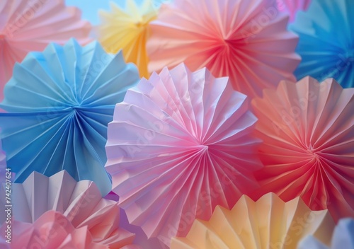 colorful and creative paper fans on white