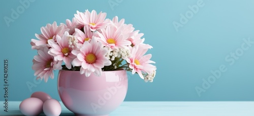 easter egg in flower cup on the blue background