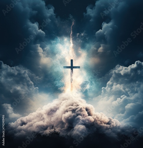 a cross in the sky above clouds