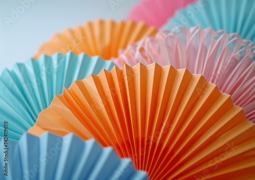 colorful and creative paper fans on white