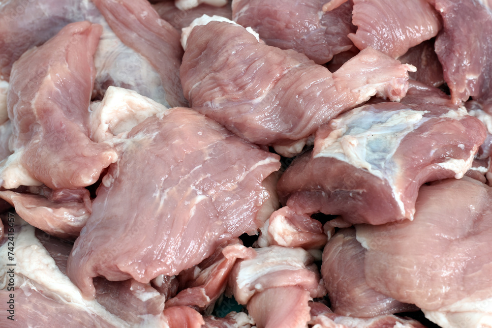 Pork meat, back, cut into pieces for making goulash.