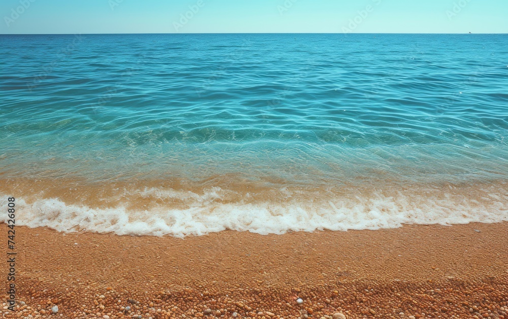 A sandy beach with incoming waves crashing onto the shore, creating white foam as they recede back into the ocean A sandy beach with incoming waves crashing onto the shore, creating white foam as they recede back into the ocean