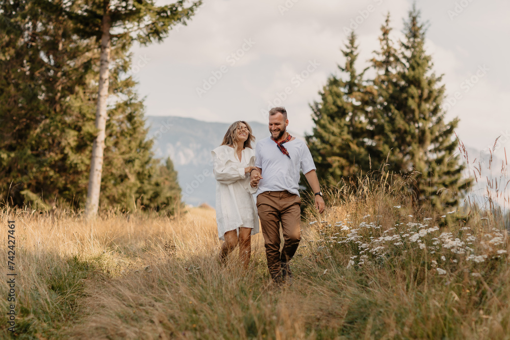 Millennial couple of lovers enjoying non-traditional Valentine’s Day time outdoor. Handsome guy with nice girl on deep intimate moment Millennial couple of lovers enjoying non-traditional Valentine’s Day time outdoor. Handsome guy with nice girl on deep intimate moment