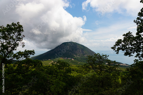 Mount Ayu Dag with clouds on the background of the Black Sea in the early morning.