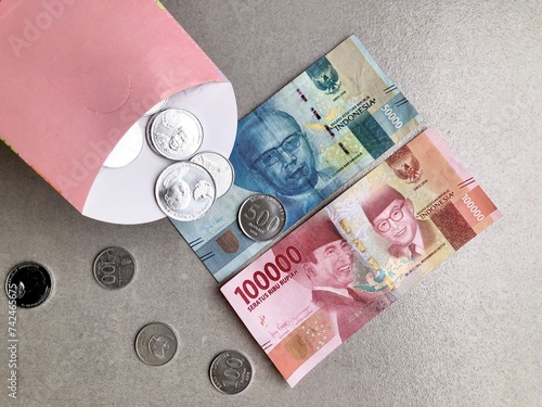 Indonesia Money Rupiah, 100.000 and 50.000 also coin IDR, Indonesia Currency, Background Money Indonesia
 photo