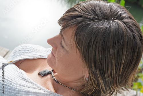 Blonde caucasian woman thinking and sad outdoors