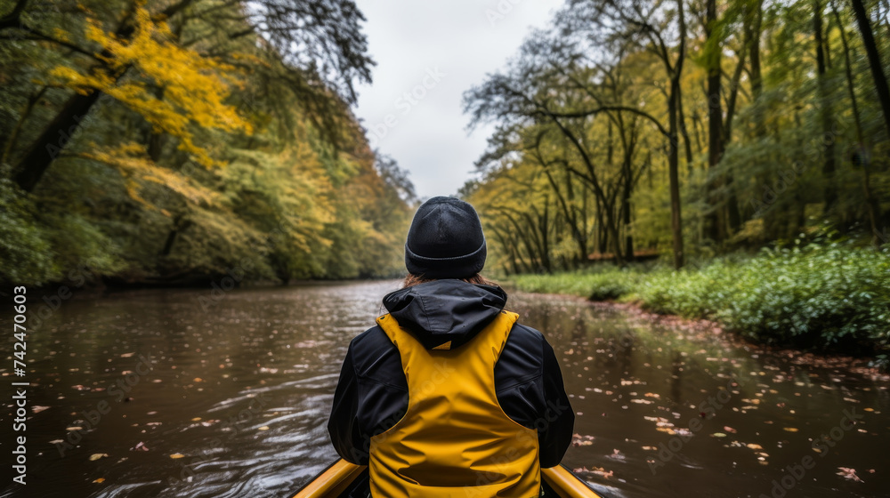 Kayaking in a breathtaking river setting with ample room for text and artistic enhancements Kayaking in a breathtaking river setting with ample room for text and artistic enhancements