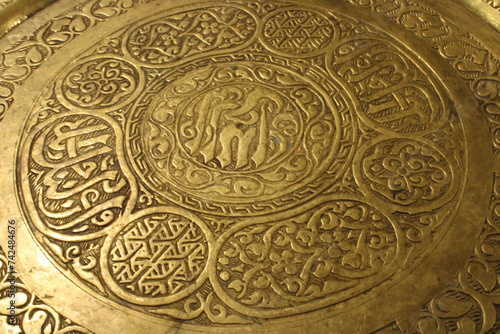 old oriental metal plate © manudoodle