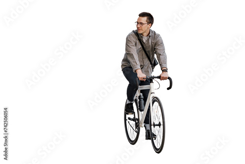 A man riding his bicycle as a means of eco-friendly transportation in the city.
