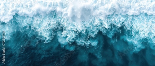 a large body of water with a wave coming in from the top and bottom of the wave to the bottom of the water.