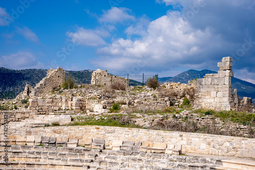 The remains of an Opramoas monument, aqueduct, a small theater, a temple of Asclepius, sarcophagi, and churches from Rhodiapolis, which was a city in ancient Lycia. Today it is located in Kumluca photo