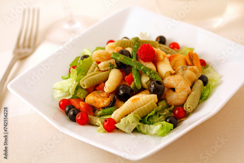 Salad with seafood, veggies and fruit.