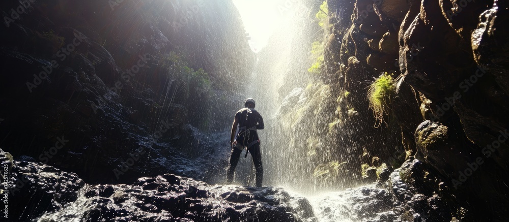 Fototapeta premium Quito and Danube Fusion: Explore the Adrenaline-Packed World of Freefall Canyoning in Bearna Valley, Lanzarote, Infused with the Daring Styles of Quito School and Danube School. 