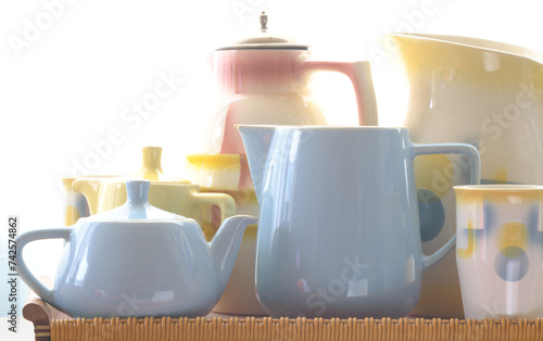 Beautiful, vintage crockery,dishes ,coffe pot, filter, mugs,jar,multicolored, white background,free copy space