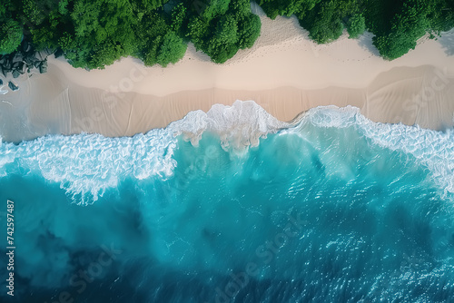 Aerial view of the ocean bordering a sandy beach, with waves gently crashing on the shore. Vacation, travel concept photo