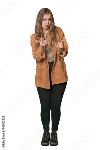 Studio portrait of a blonde Caucasian woman showing that she has no money. © Asier