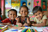 Three smiling kids looking at the camera during a workshop